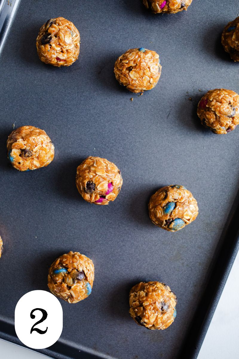 Energy bites on a baking sheet.