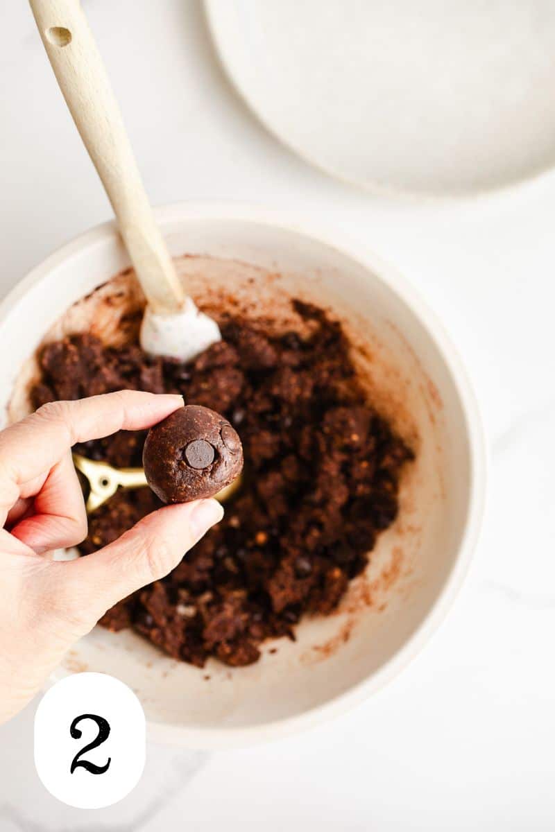 Brownie balls in a mixing bowl. 