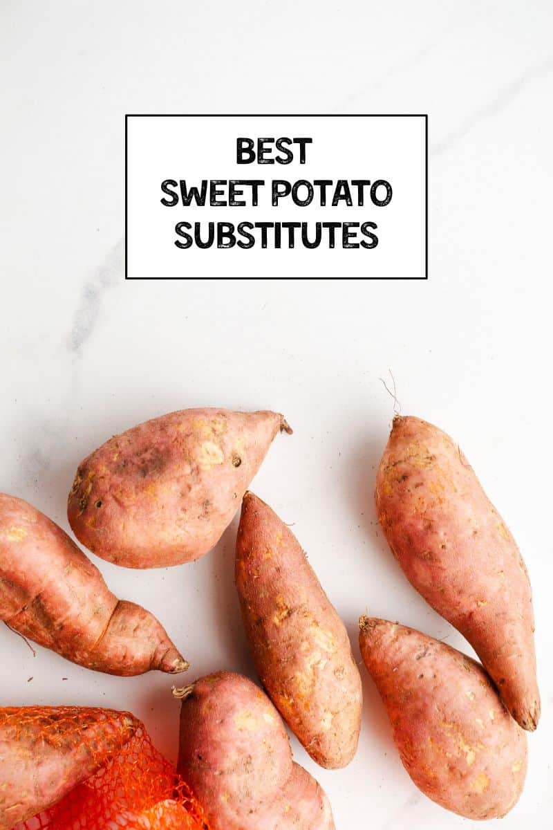 Raw sweet potato on a marble surface. 