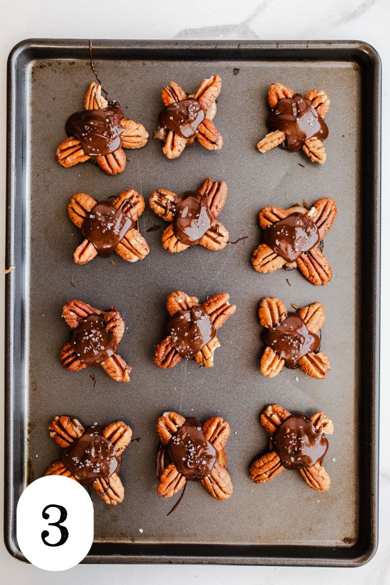 Turtle candy on a baking sheet.