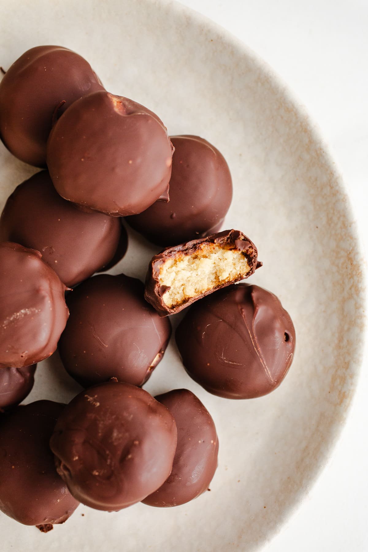 Chocolate tagalongs cookies on a plate. 