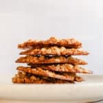 Cookies stacked on a plate.