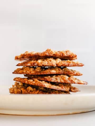 Cookies stacked on a plate.