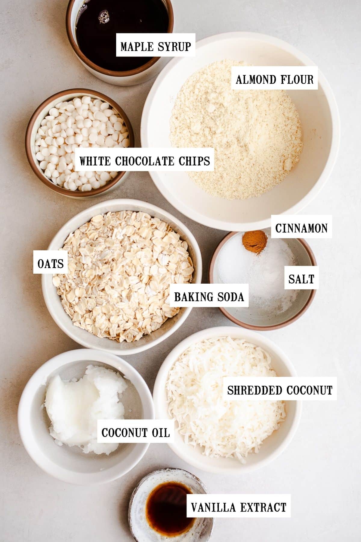 Small bowls filled with cookie ingredients.