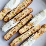 Pistachio biscotti on a plate.