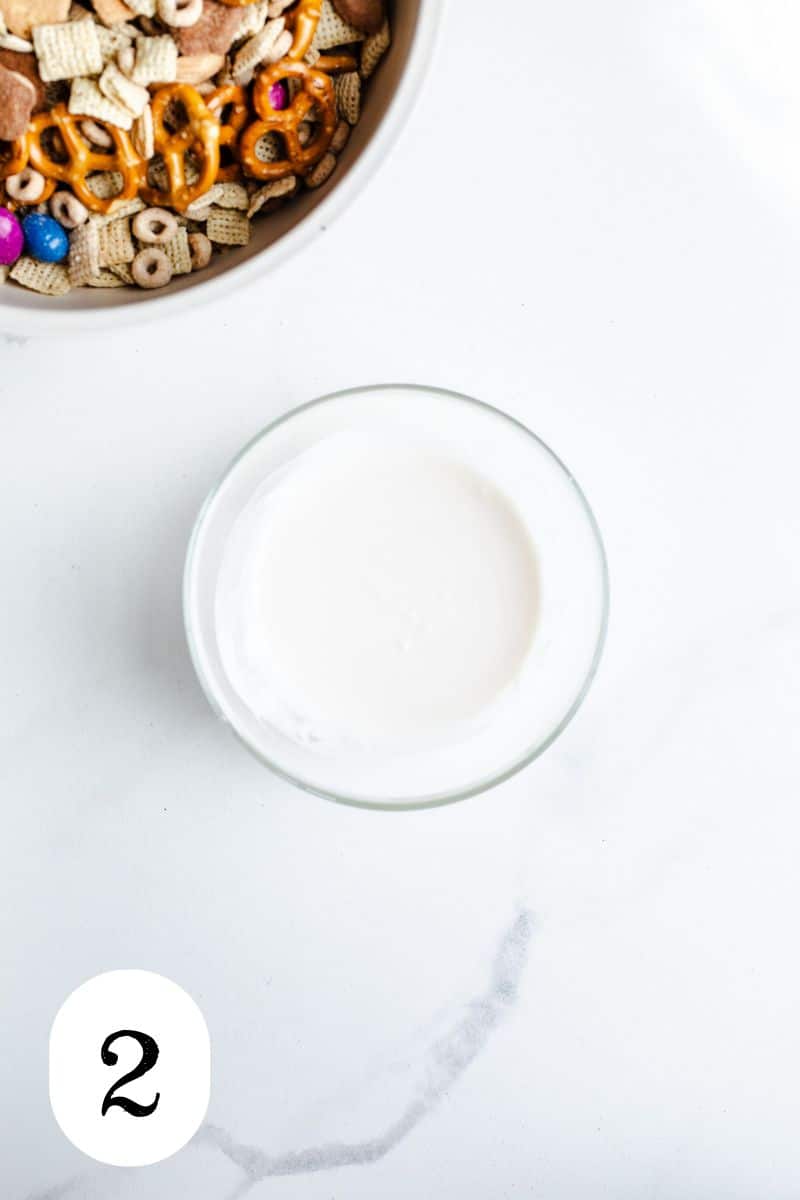 Melted white chocolate in a bowl. 