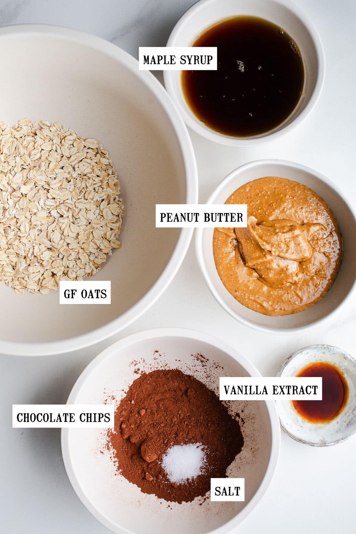 Ingredients for no bake bars in small bowls.