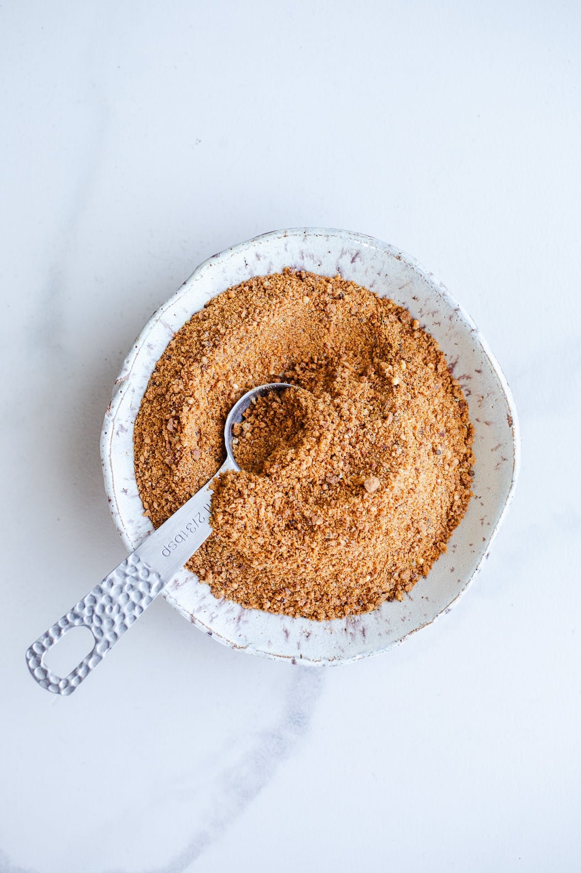 Breadcrumbs in a small bowl.