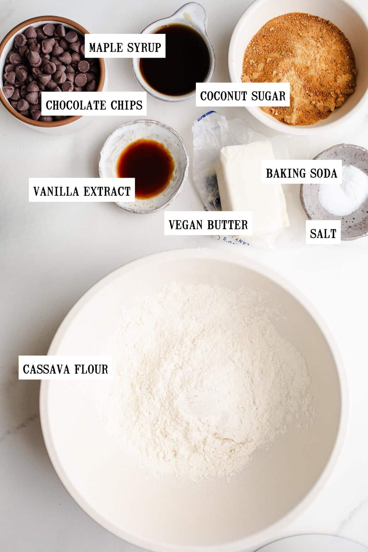 Ingredients for cookies are in small bowls.