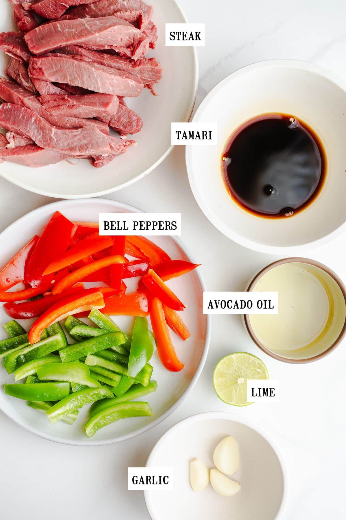Ingredients to make stir fry in small bowls.