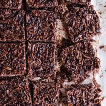 Coconut chocolate bars on parchment paper.