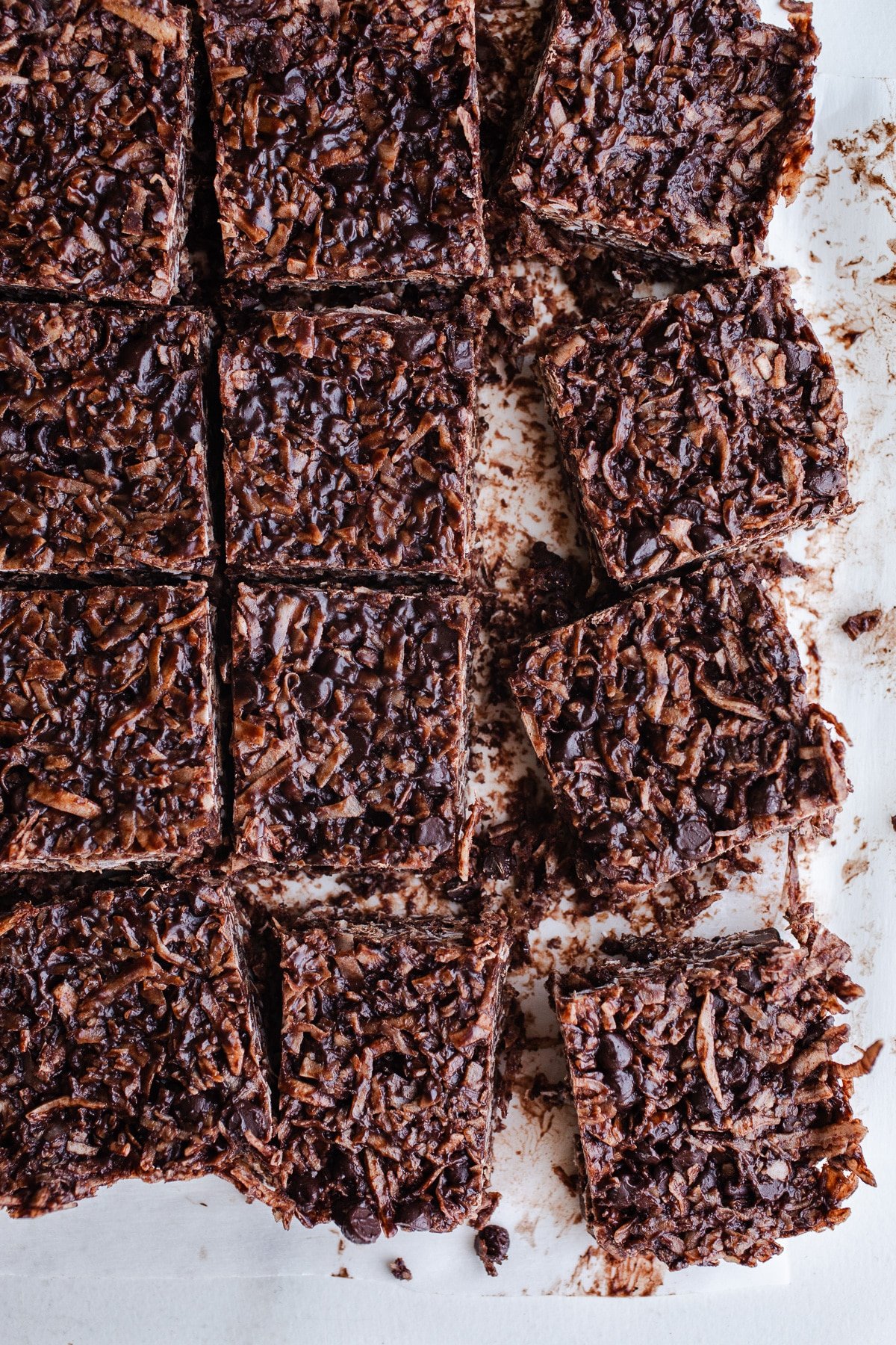 Coconut chocolate bars on parchment paper.