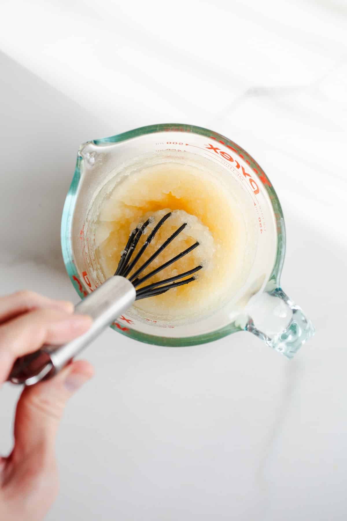 Gelatin in a glass measuring cup.