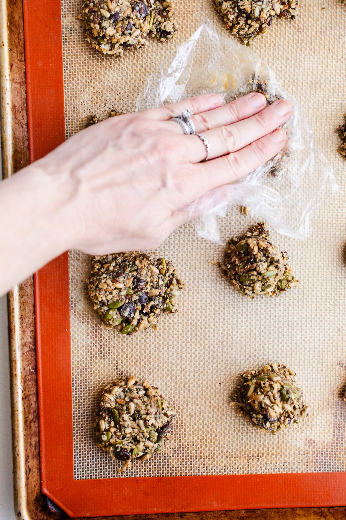Seed cookie dough on a baking sheet.