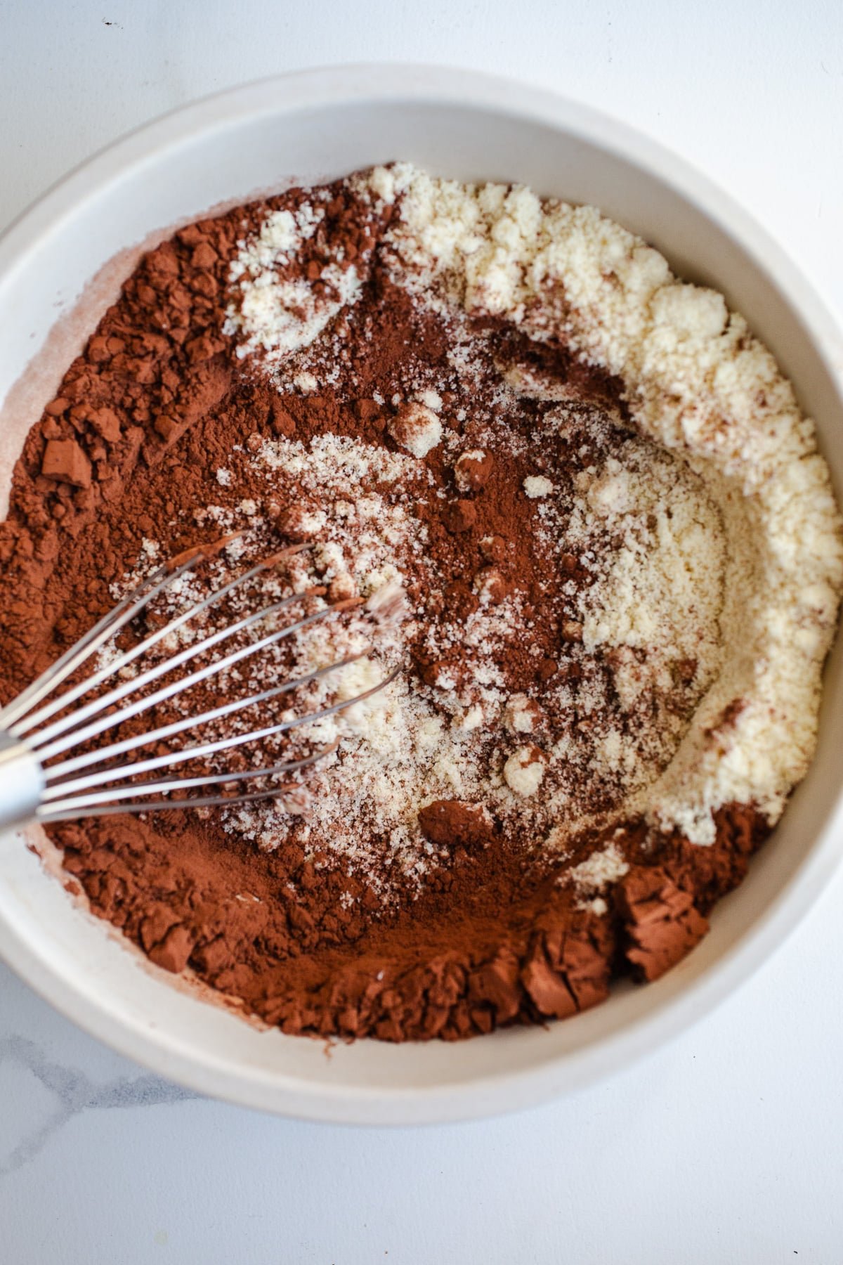 Almond flour and cocoa flour in a bowl. 