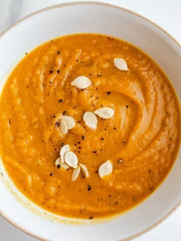 A bowl of acorn and pumpkin soup.