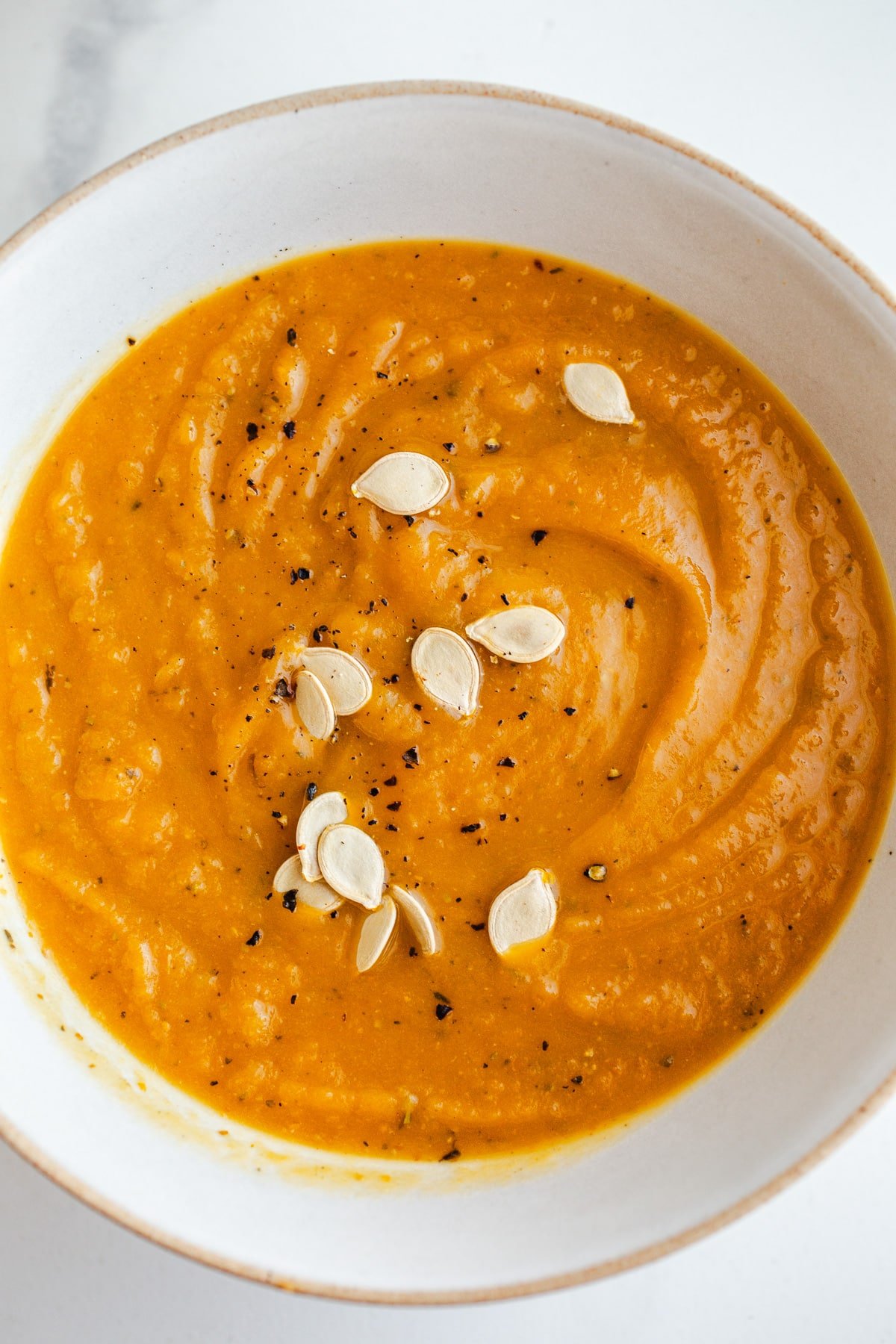 A bowl of acorn and pumpkin soup.