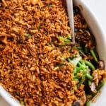 Green bean casserole in a white dish.