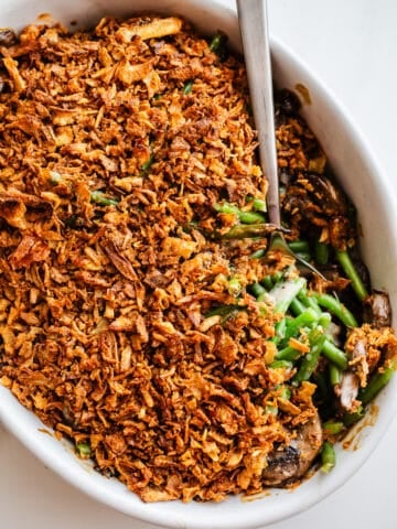 Green bean casserole in a white dish.
