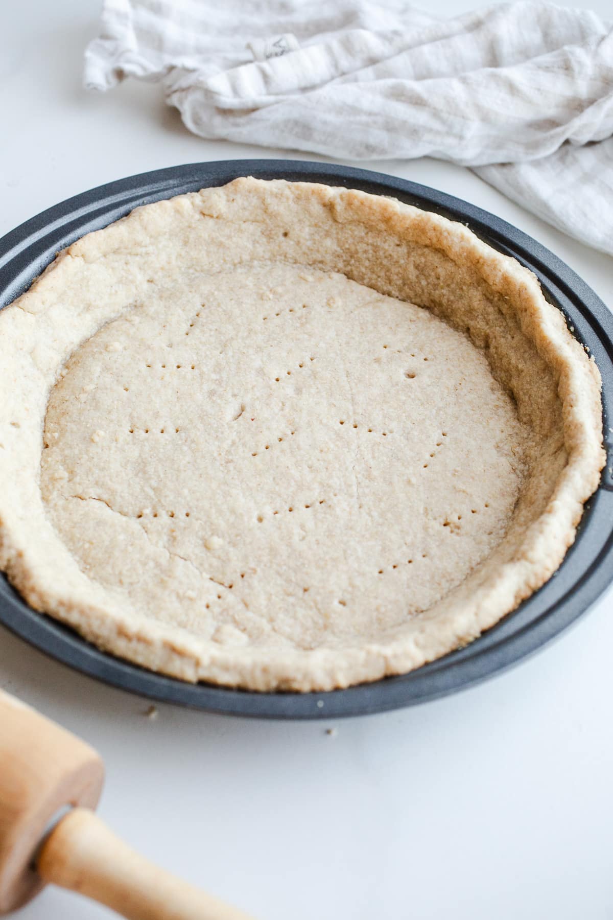 Baked pie crust in a pan.