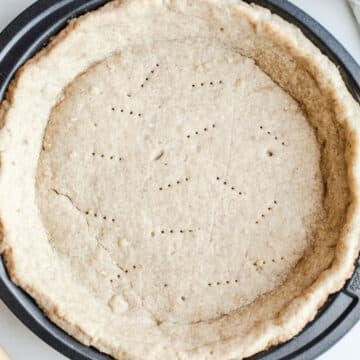 Baked pie crust in a pan.