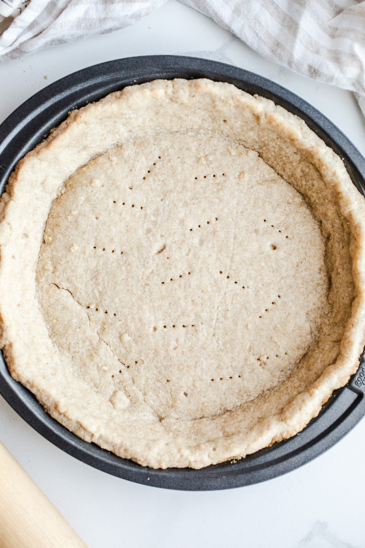 Baked pie crust in a pan.