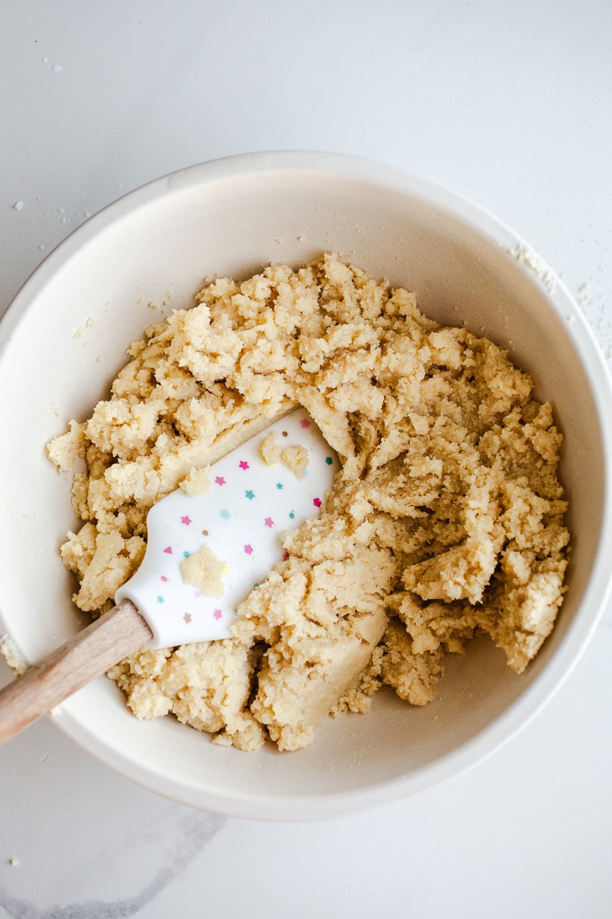Almond flour dough in a mixing bowl.