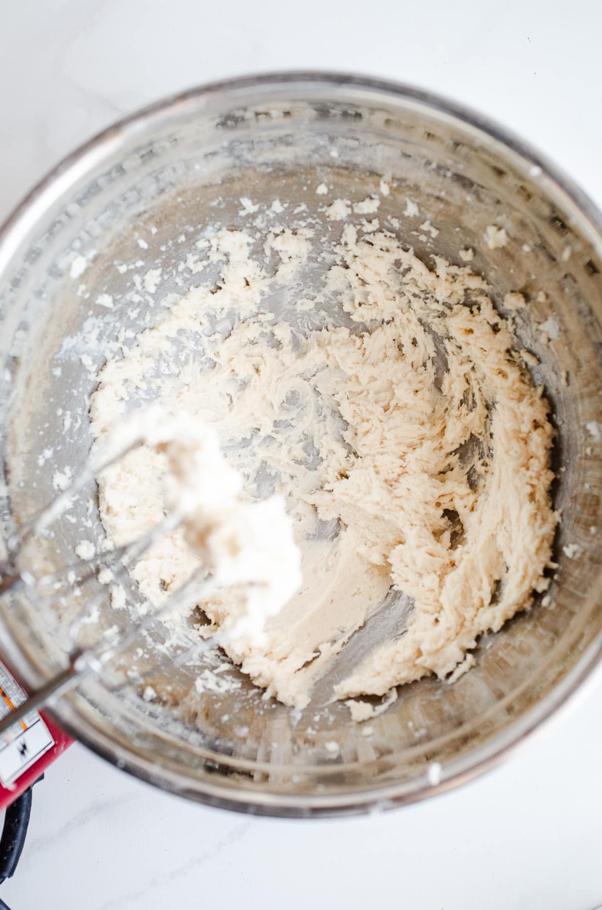 Frosting ingredients in a mixing bowl.