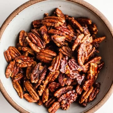 Candied pecans in a bowl.