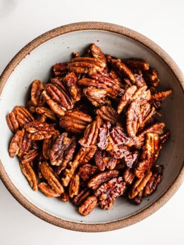Candied pecans in a bowl.