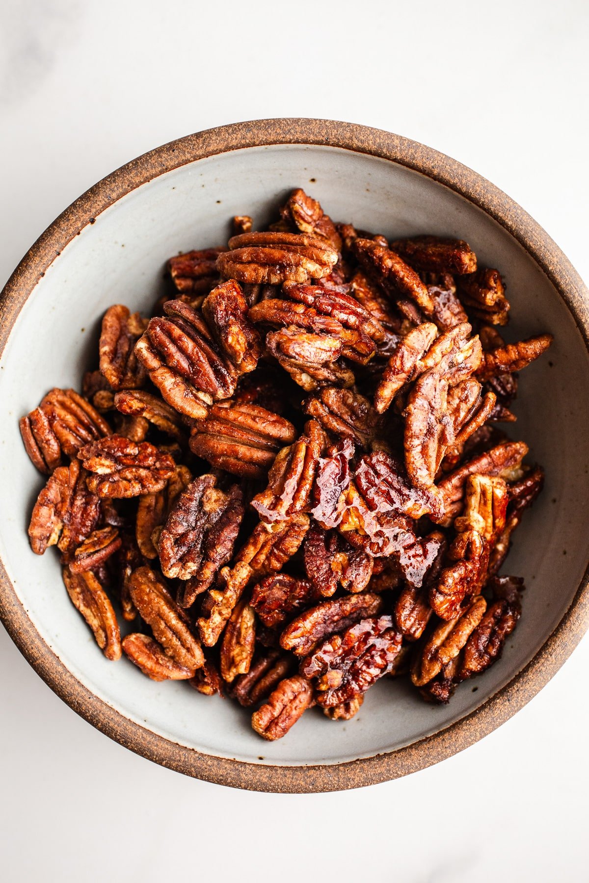 Candied pecans in a bowl.