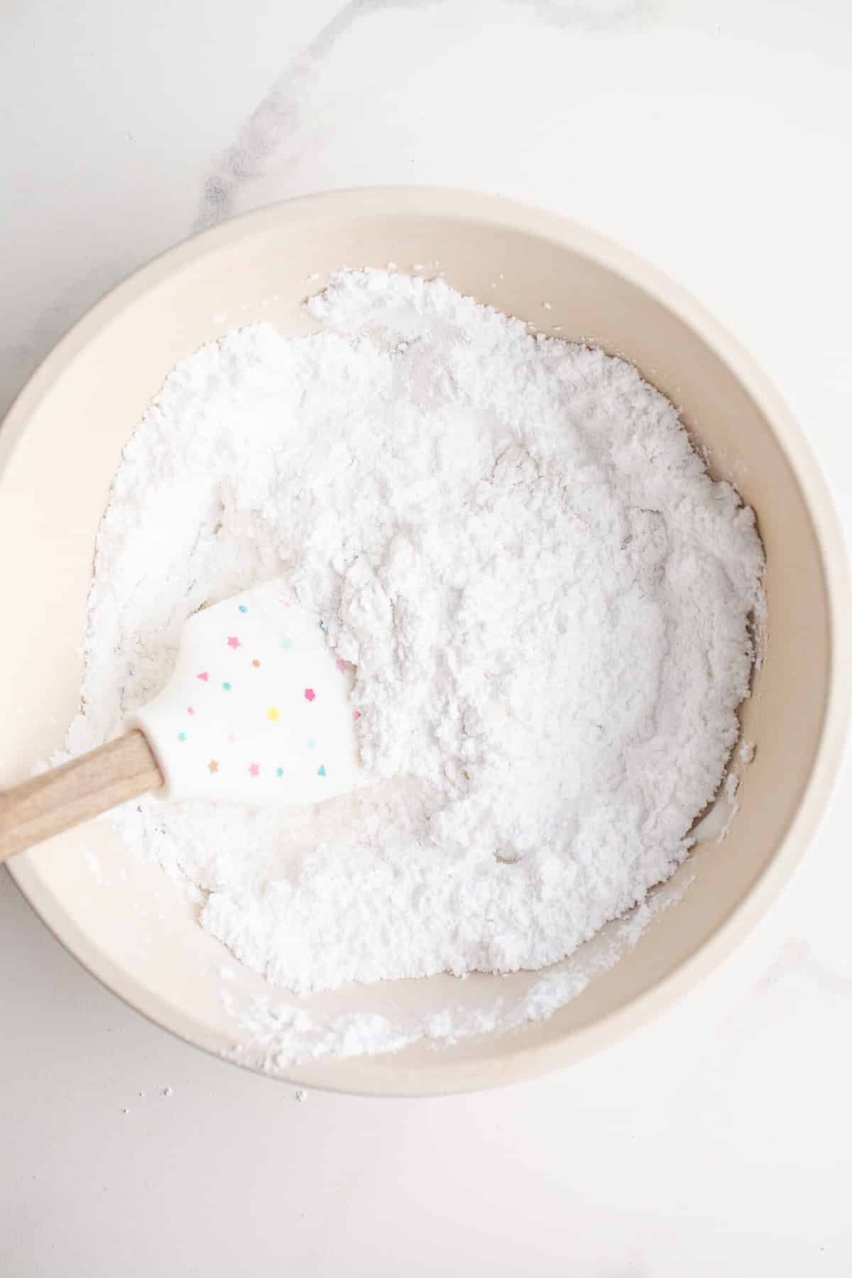 Powdered sugar in a mixing bowl.
