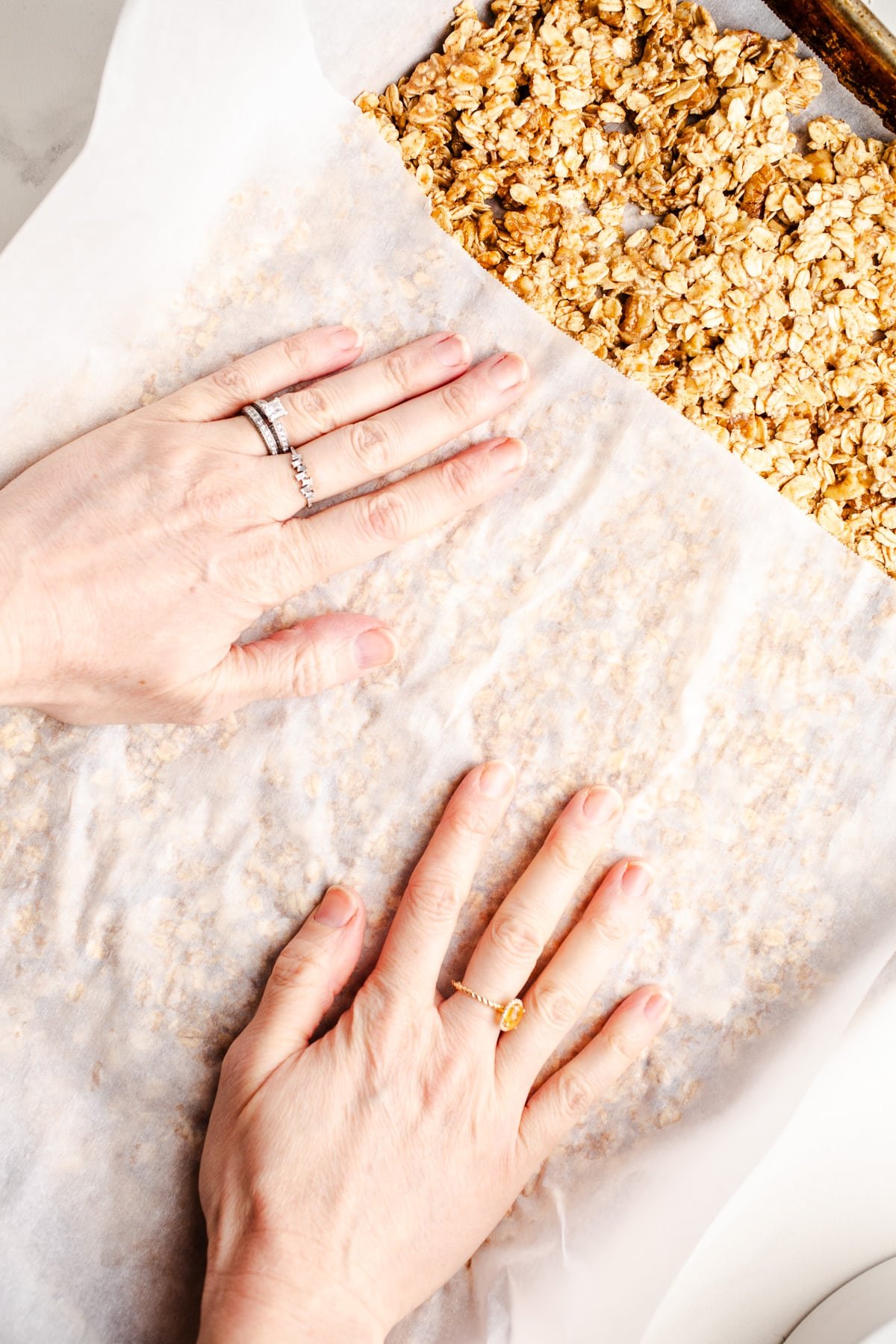 Oats pressed into a baking pan. 