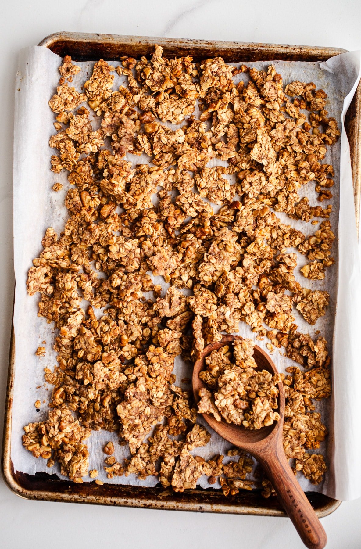 Banana bread granola in a baking pan. 