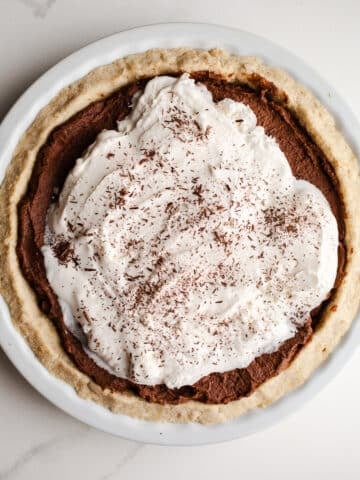French silk pie on a marble surface.