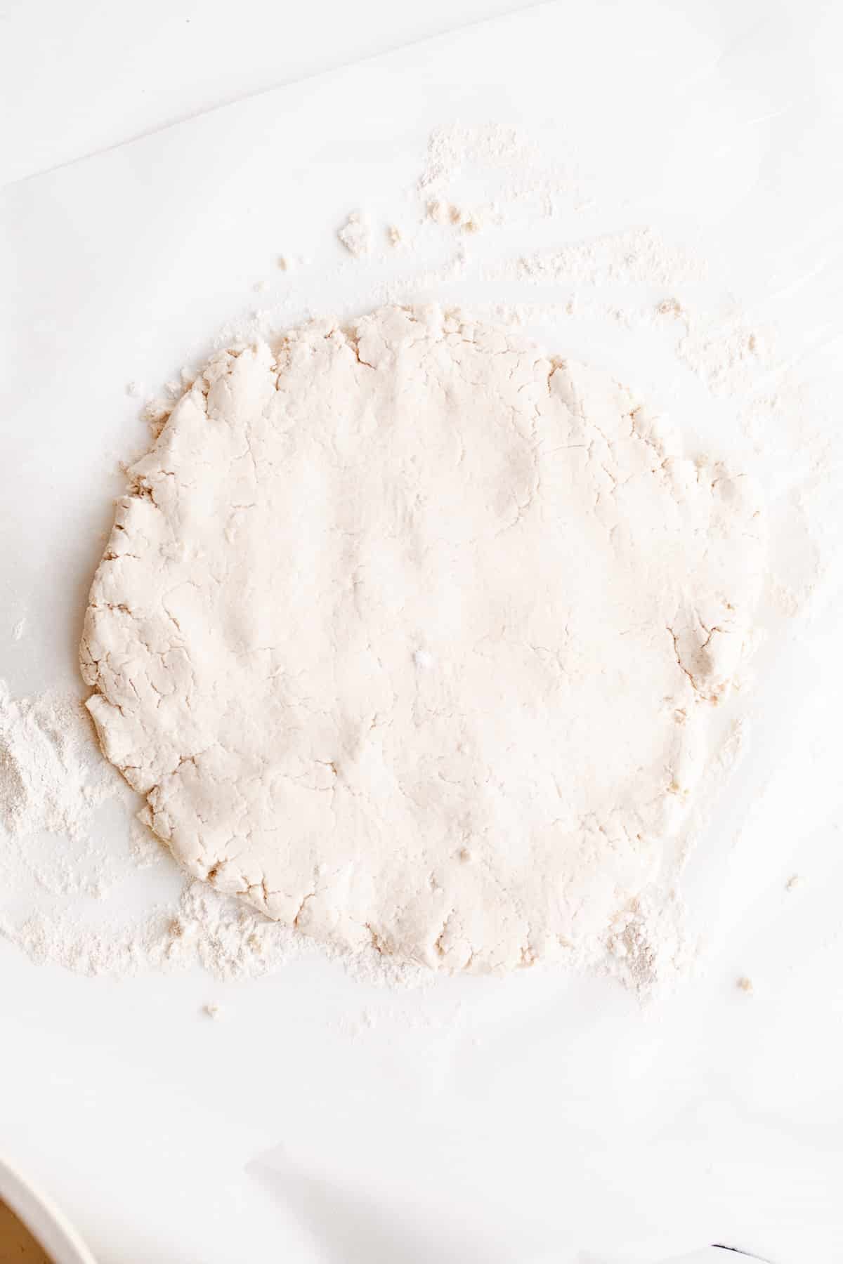 Dough rolled in a circle.