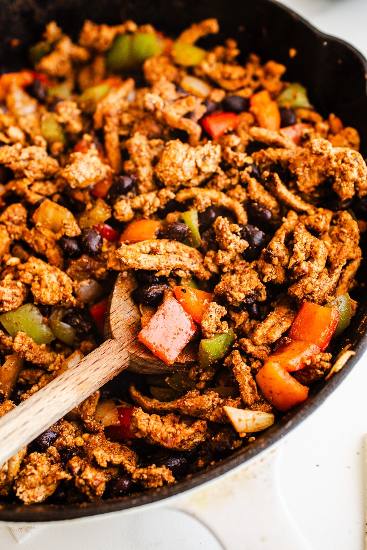 Taco skillet with a spoon.