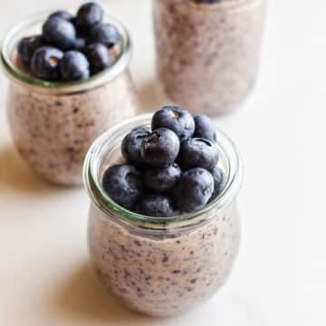 Blueberry chia pudding in mason jars.
