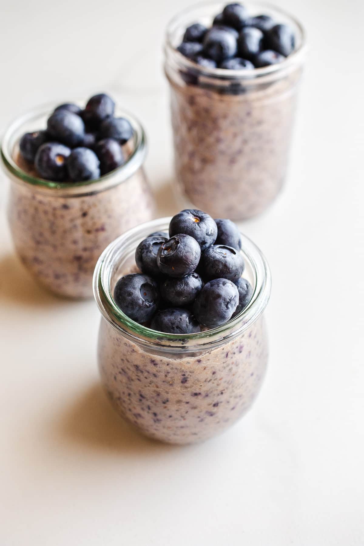 Blueberry chia pudding in mason jars. 
