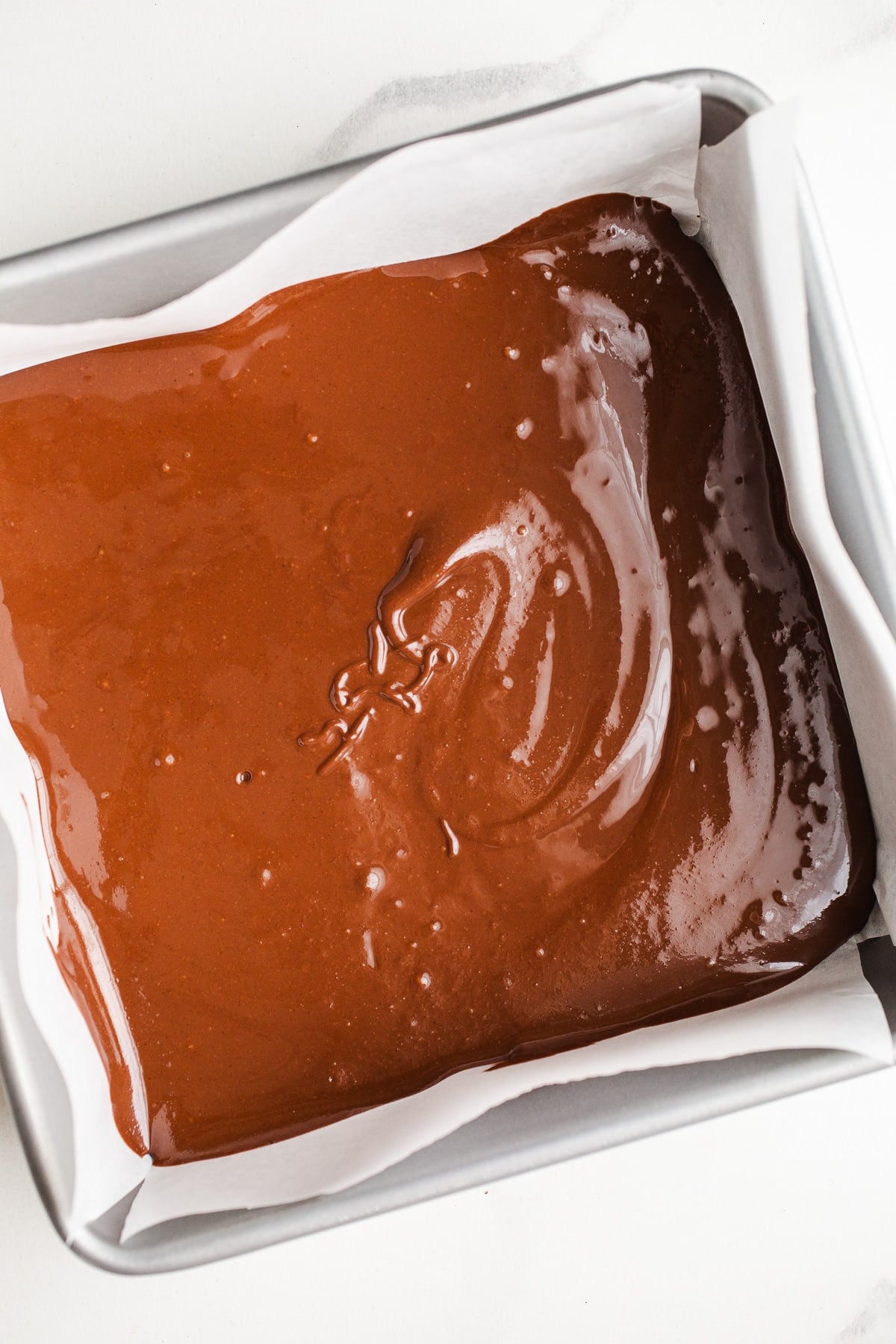 Melted chocolate in a baking pan.