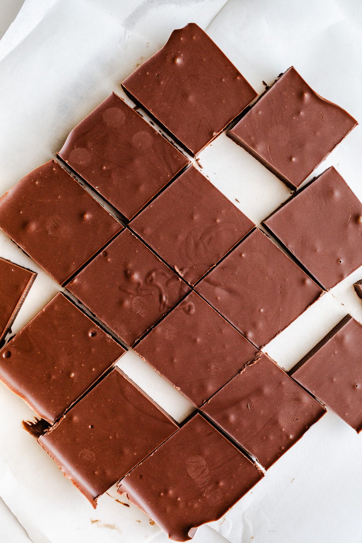 Chocolate bars on parchment paper.
