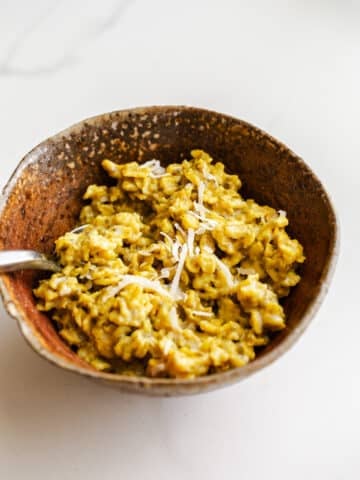Golden oatmeal in a rustic bowl.