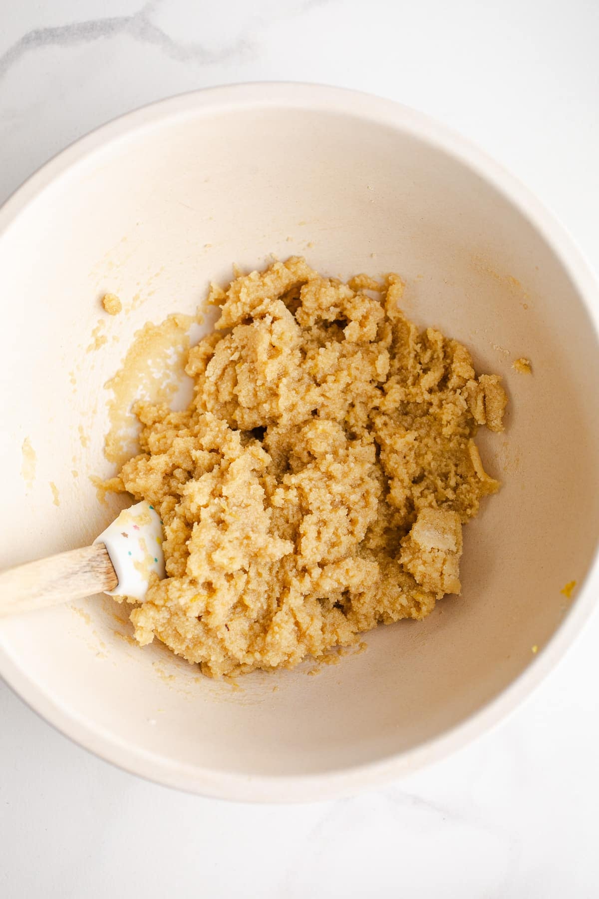 Almond flour cookie dough in a bowl.