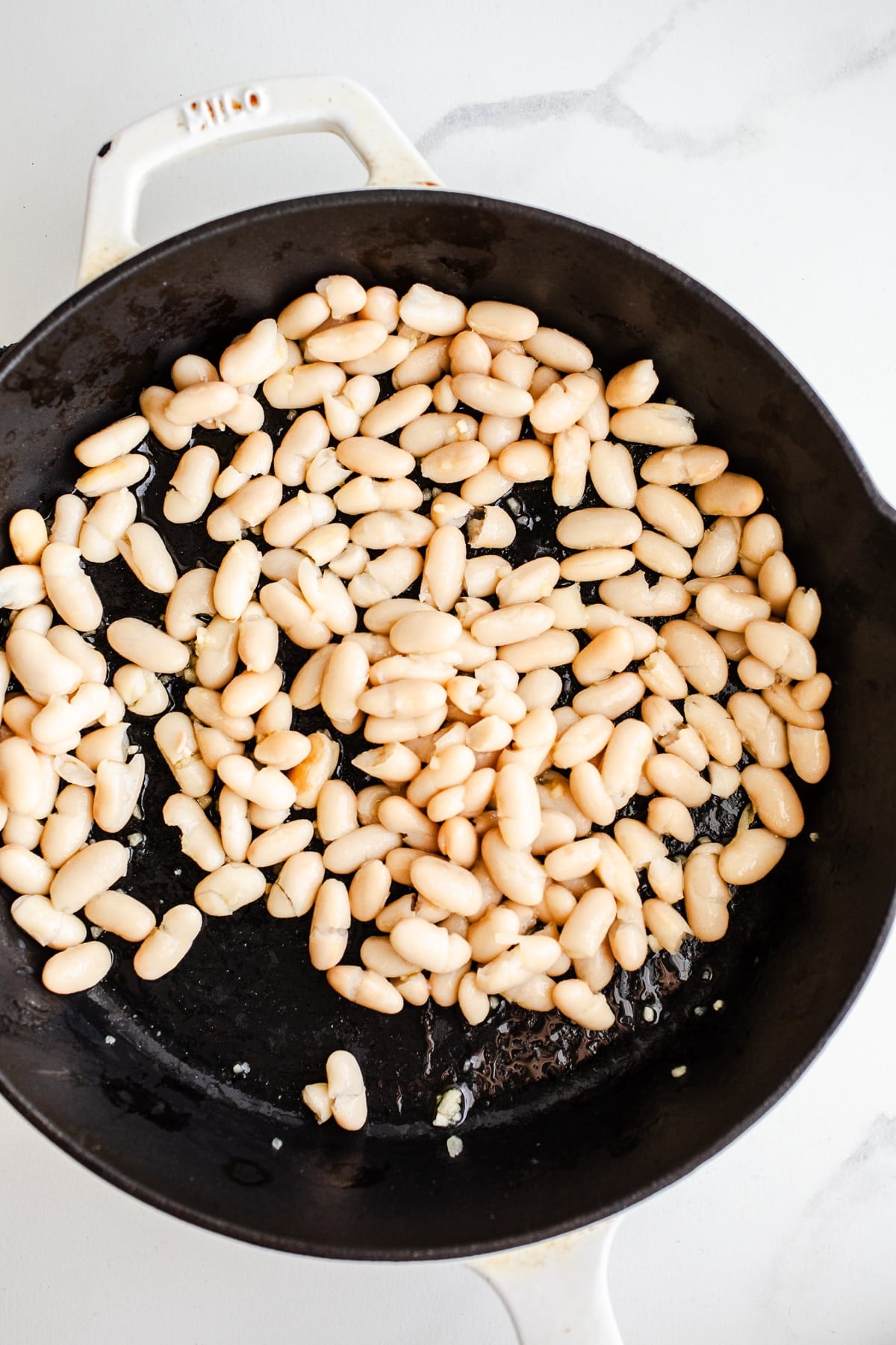 White beans in a skillet.