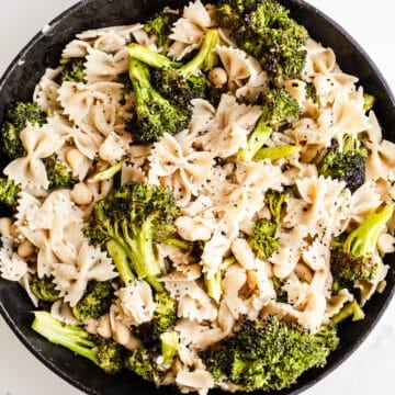 Pasta and broccoli in a skillet.