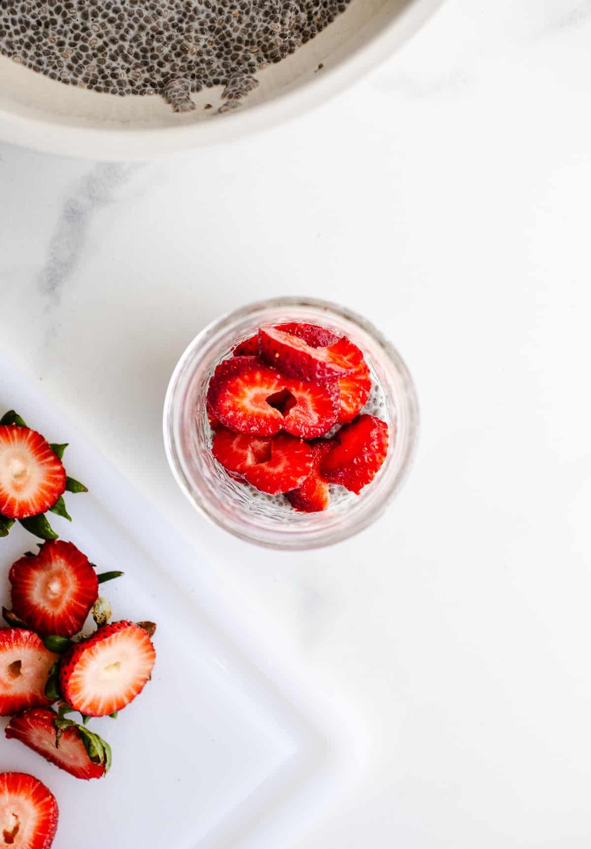 Strawberries in a mason jar.