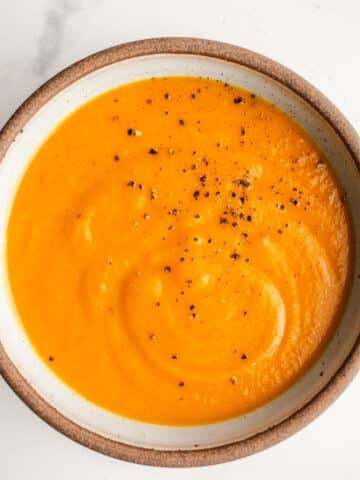 Sweet potato carrot soup in a bowl.