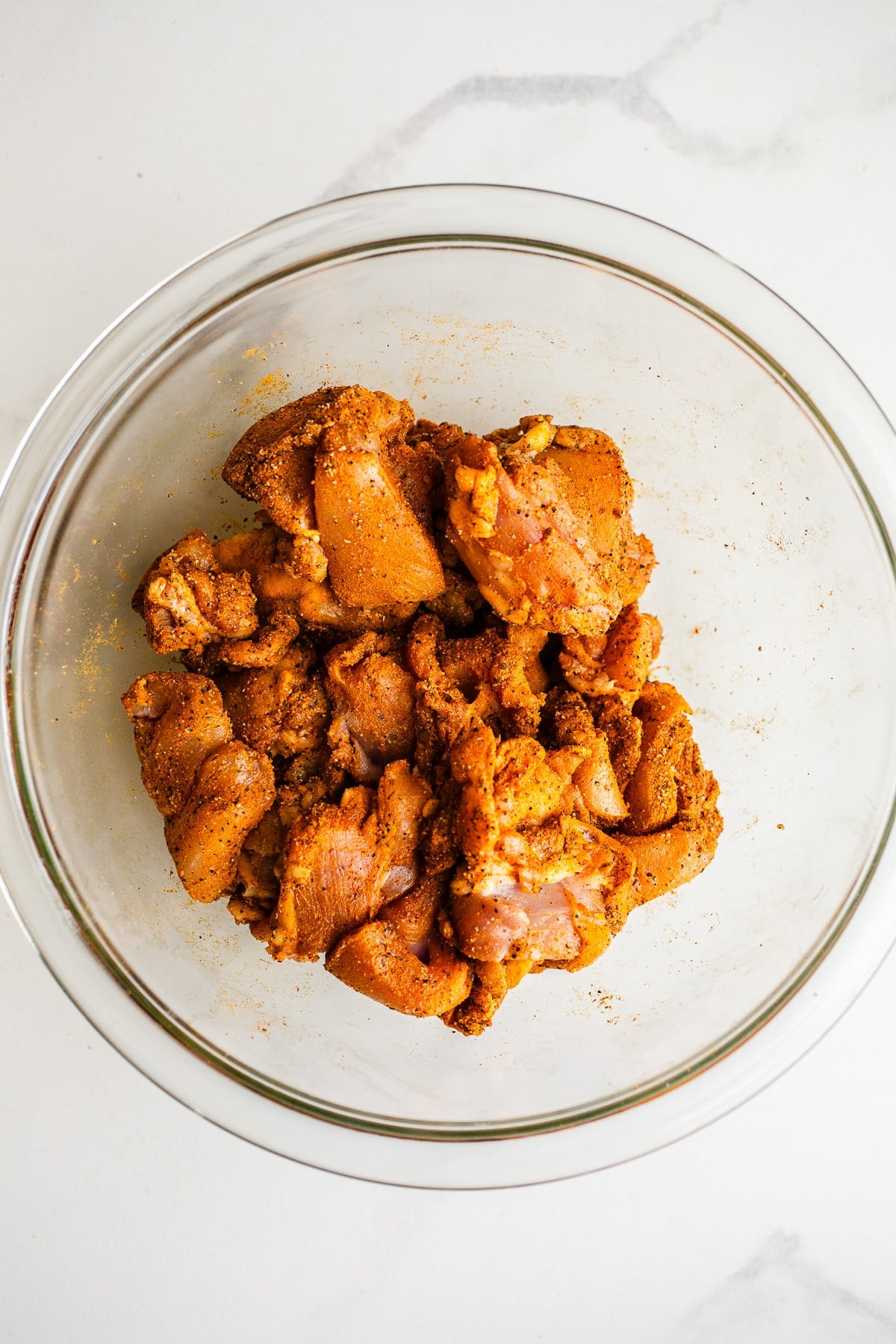 Raw chicken in a bowl.
