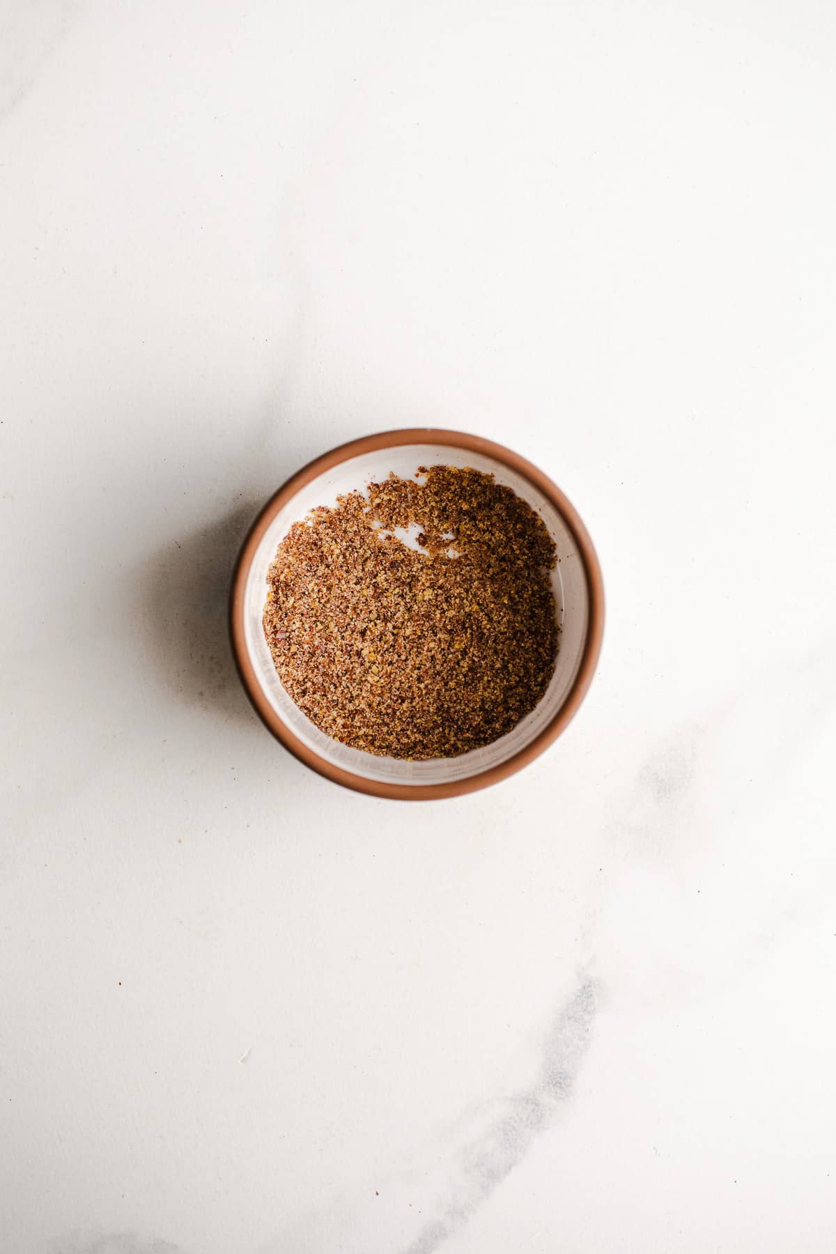 Ground flaxseed in a bowl.