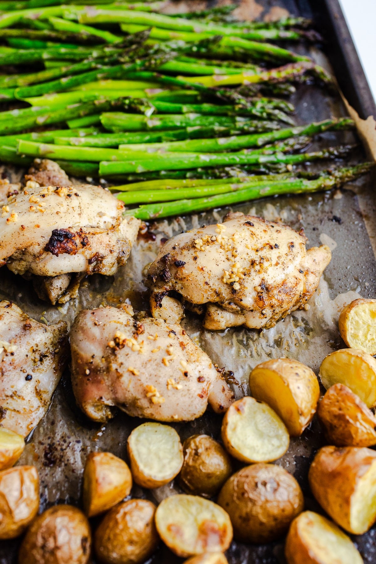 Sheet pan chicken, asparagus, and potatoes.